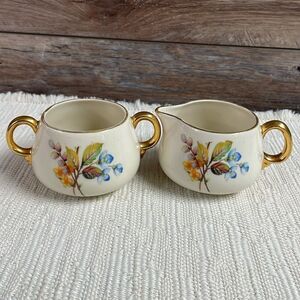 Cream and Sugar Porcelain Set with Gold Leaf Trim and Floral Design